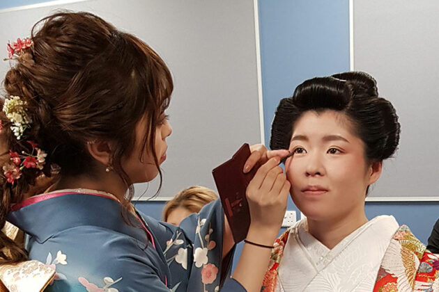 Student demonstrating traditional Japanese make-up