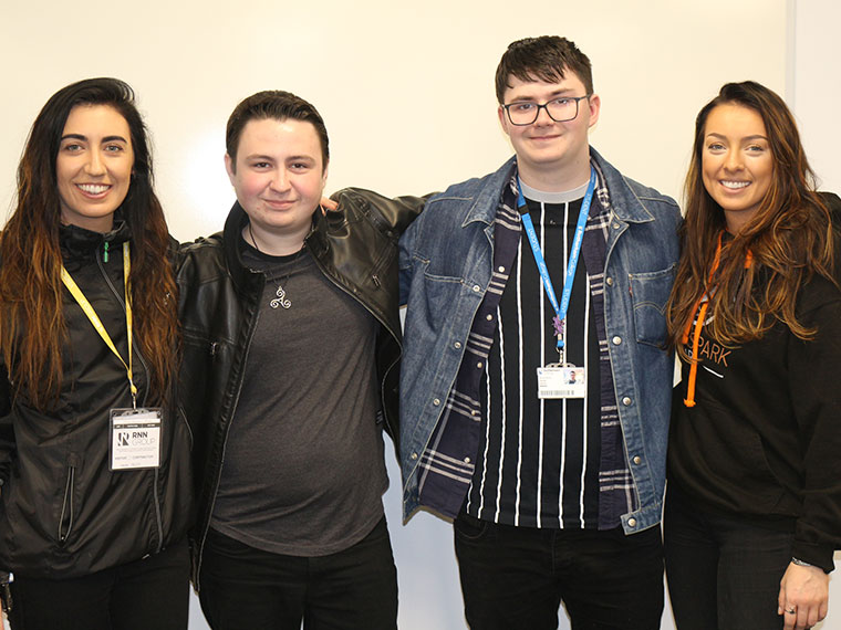 Helen and Ellie pictured with current students.