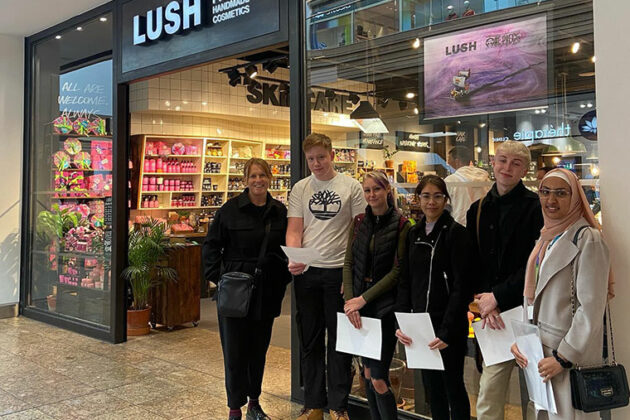Graphics students stood outside Lush store