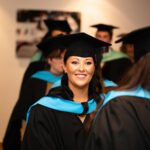 A head and shoulders shot of a student on graduation day