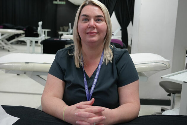 Student Lucy, sat in a beauty salon setting